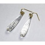 A pair of rock crystal earrings set in 18 carat gold