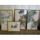 A pair of Chinese painted silk panels depicting exotic birds inscribed in Chinese 50cm x 27.5cm