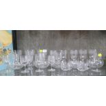 A set of Hungarian glasses, with scroll decoration and star cut feet, 24 pieces, including hi-balls,