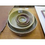 Five soapstone bowls, the largest 21cm diameter
