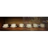 A set of six Carltonware brown glaze tea cups and saucers
