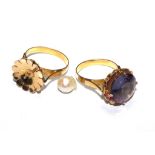 Two gold dress rings, one set in pearl and one set in amethyst