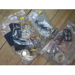 Two bags of costume jewellery and a bag of watches