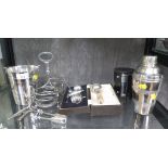 A silver plated ice bucket, a boxed three piece cruet, a cocktail shaker, etc