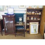 An oak open bookcase with ivy leaf carved frieze 77cm x 130cm, an oak whatnot with barley-twist