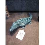 A Poole pottery model of an alligator, in a blue glaze 26cm long