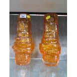 A pair of Whitefriars glass hooped vases, in tangerine, designed by Geoffrey Baxter 29cm high