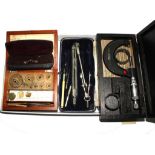 A box of weights, a spectacles case and spectacles, engineering instruments, etc