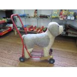 A Lines Bros Triang push along dog, 61cm high