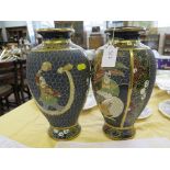 A pair of Japanese stoneware vases with enamel decoration of figures and a dragon, six character