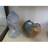 A vintage Escamo art Inuit art sculpture by Abbott-Canada of a fisherman with a large fish