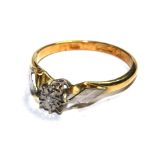 An 18 carat gold ring set with single diamond