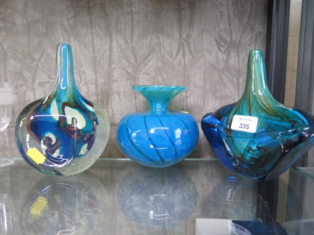 A Mdina fish shape vase, 18cm high, another similar and a Mdina vase 13cm high