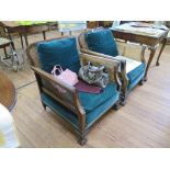 A pair of 1920s stained beech bergere armchairs with cane backs and arms, on cabriole legs with ball