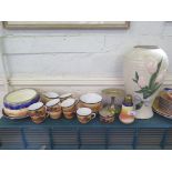 A set of Kokura Japanese tablewares with desert scenes and a Brentleigh ware vase with tulip design