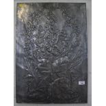 A moulded pewter panel depicting a floral spray 64.5cm x 45cm