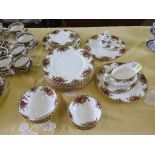 A Royal Albert Old Country Roses pattern part dinner service, including sauceboat, salt and pepper