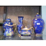 Two Carltonware ginger jars and covers in powder blue with Chinoserie designs, largest 34cm high,