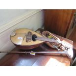 An Italian mandolin, label for Francesco Perretti & Figli, length of back 31cm, a silver plated horn