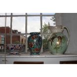 A large pottery water jug with gilt decoration, a stone china bowl with Imari decoration, and a vase