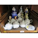 Six Beatrix Potter miniature teapots, a Coalport figure, two Royal Doulton figures and other