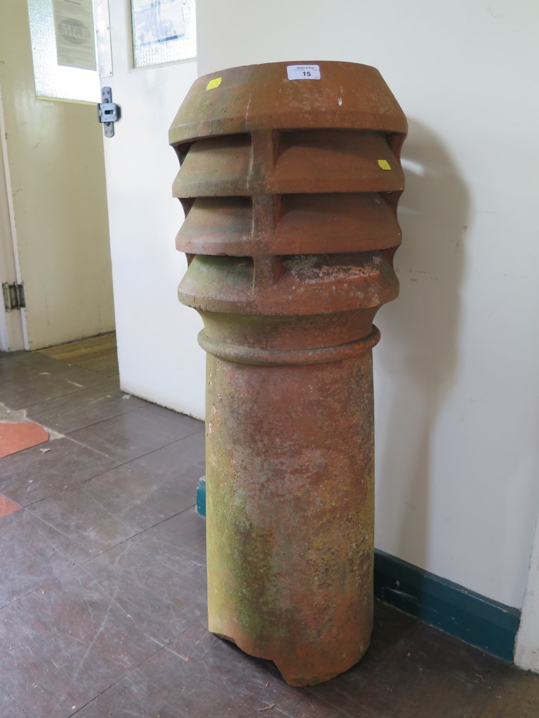 A terracotta chimney pot, 90cm high