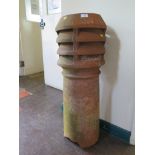 A terracotta chimney pot, 90cm high