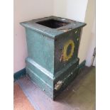 A Victorian cast iron garden plinth, of square form with wreath motif, 46cm square, 66cm high