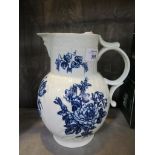 A Worcester cabbage leaf mask jug, with blue and white 'heavy naturalistic floral' design,