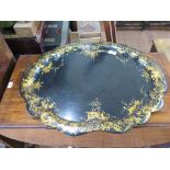 A Victorian papier mache tray, by Jennens and Bettridge, shaped oval form gilded with foliate scroll