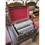 A Perkins Brailler machine in case