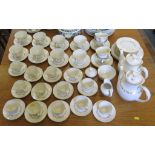 A Royal Doulton Fairfax tea and coffee service comprising twelve tea cups and saucers, twelve coffee