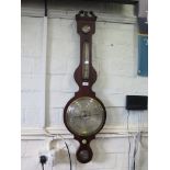 Am early 19th century mahogany banjo barometer with ebony stringing, hygrometer, thermometer, spirit