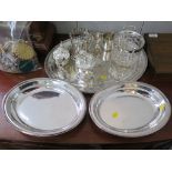 A miscellaneous collection of silver plate to include ice bucket, oval tray, wine bottle holder,