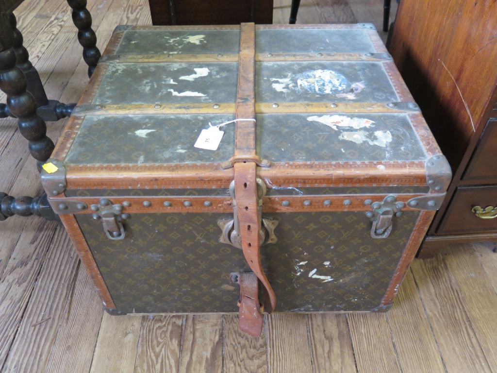 A Louis Vuitton cabin trunk, with internal label numbered 786106 and stamped buckles, lacks internal