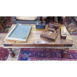 An Oriental hardwood coffee table with metal mounts, 110cm x 60cm x 40cm high