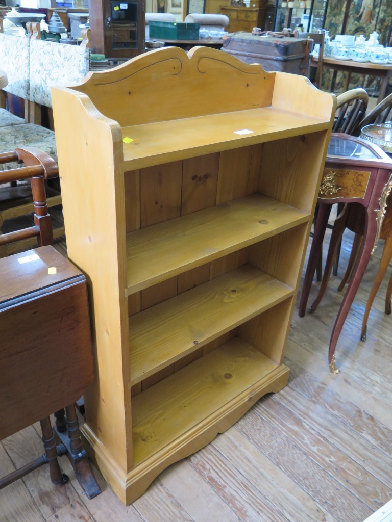 An Ercol dark oak square coffee table, 75cm wide; a pine open bookcase, 58cm wide and a mahogany - Image 2 of 2