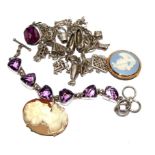 A small bag of jewellery to contain silver charm bracelet, amethyst bracelet, etc