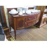 A bowfront mahogany sideboard with boxwood stringing and crossbanding, the two central drawers