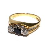 A sapphire and diamond three stone ring set in 18 carat gold