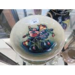 A Moorcroft Pottery floral pattern plate, initialled signature and impressed signature 18.5cm
