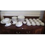 A Royal Doulton Fairfax pattern dinner service comprising twenty-four large dinner plates, twelve