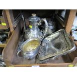 A tray of silver plate to include coffee pot, tea pot, swing handle basket, etc