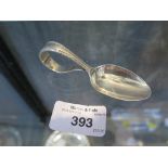 A child's silver feeding spoon