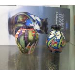 Two Moorcroft Pottery miniature vases, Symbol of Happiness 5.5cm high and Lodge Hill 5.5cm high (2)