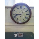 A circular mahogany framed wall timepiece clock, with painted circular dial and single train