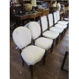 A set of four French late 19th century occasional chairs, the upholstered backs and seats on
