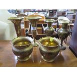 Three pairs of Indian brass vases, all with coloured foliate decoration (6)