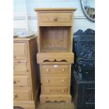 A pine chest of two short and three long drawers on bracket feet, 91.5cm wide and two pine bedside