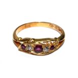 A diamond and ruby five stone ring set in 18 carat gold